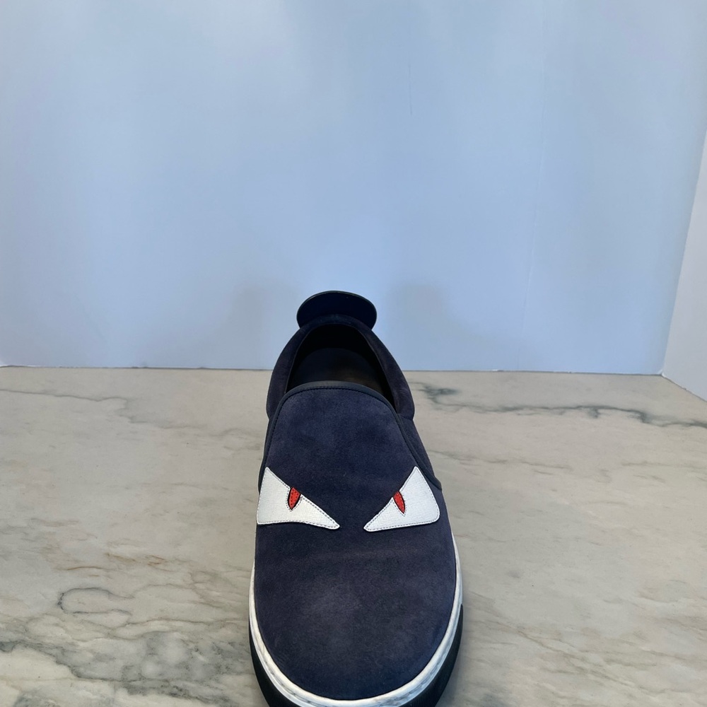 Fendi Monster suede slip on shoes for men in blue color.